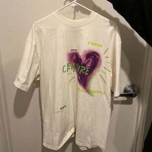 T-shirt oversized, from urban outfitters. White purple and green.